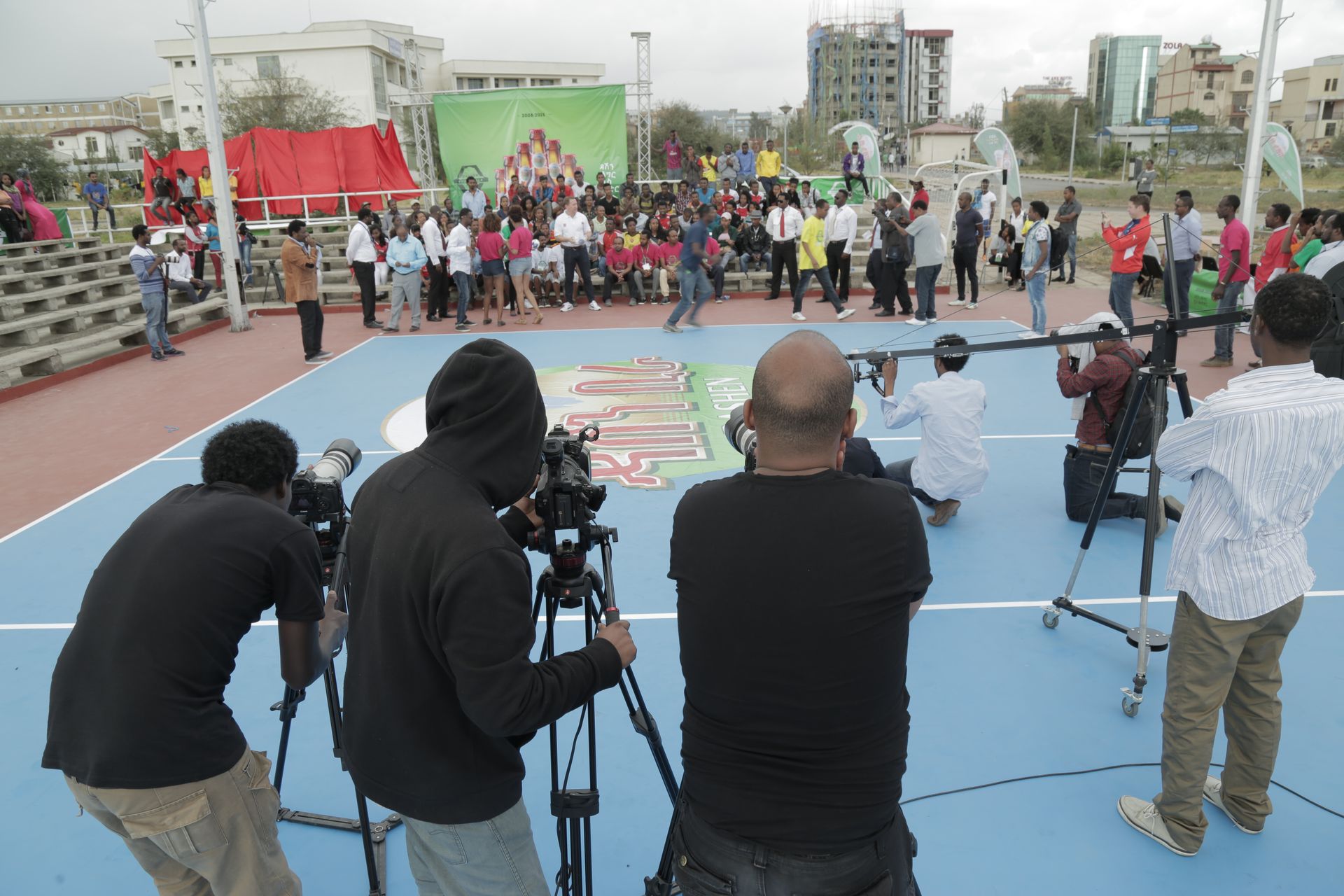 Multi-camera crew covering the Dashen Beer Football Challenge on an artificial pitch in Addis Ababa