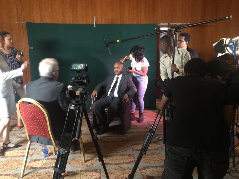 Green screen interview setup with lighting and multiple cameras on a production in Ethiopia
