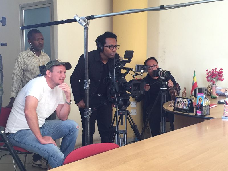 Director and crew filming a UD Trucks corporate interview in Ethiopia for Hurrah Productions